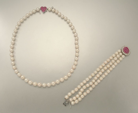 Lot image - Cultured Pearl Necklace and Bracelet with Ruby Clasps