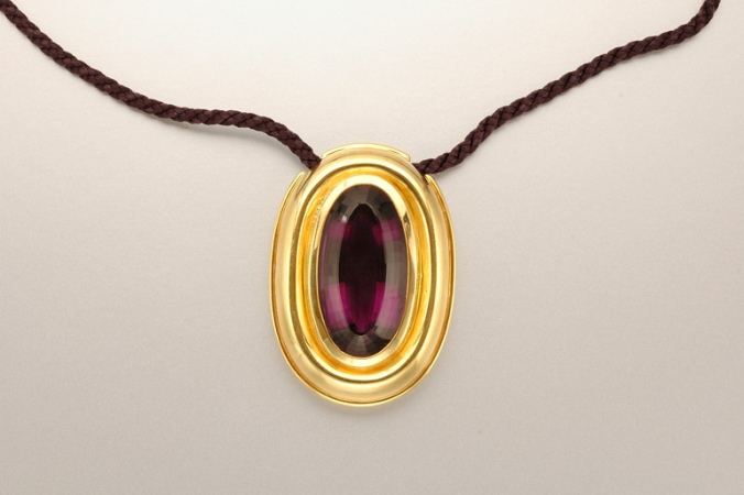 Lot image - Gold and Amethyst Pendant with Cord