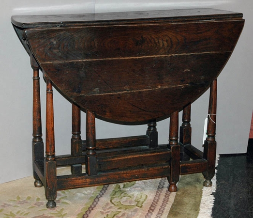 Lot image - Provincial George III Oak Drop-Leaf Gate Leg Table