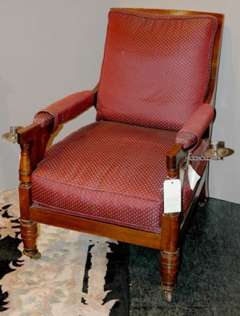 Lot image - Victorian Caned and Upholstered Mahogany Library Armchair with Candle Arms
