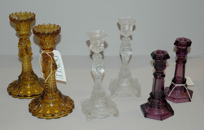 Lot image - Group of Six Clear Glass Candlesticks; Together with a Set of Three and a Pair of Colored Glass Candlesticks