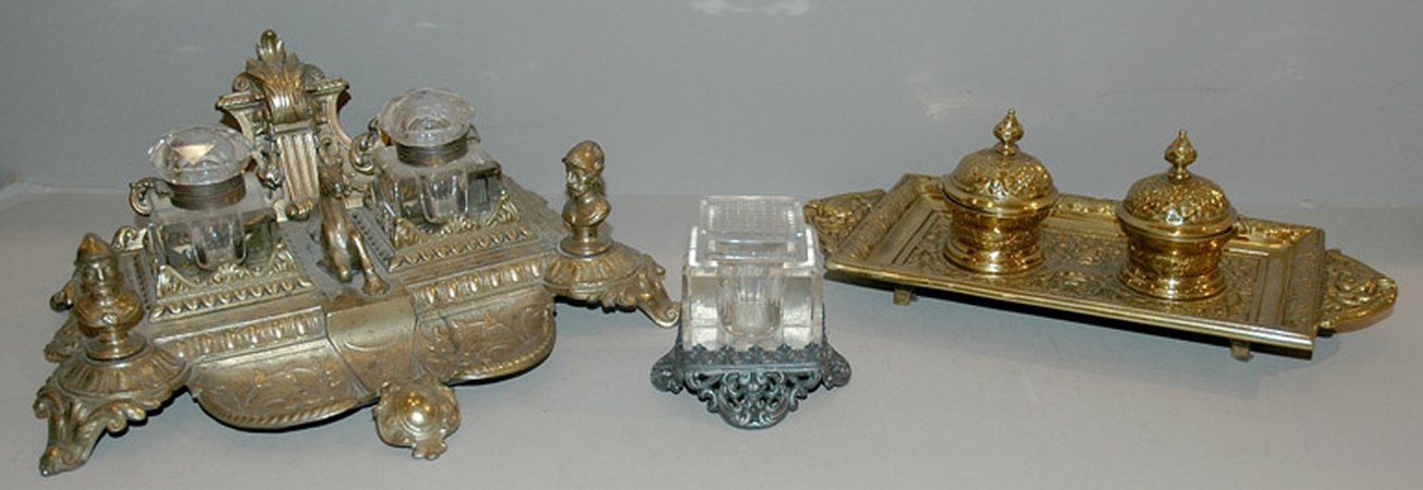 Lot image - Four Brass Two-Bottle Inkstands; Together with a Cut Glass Ink Bottle and a Brass Inkstand