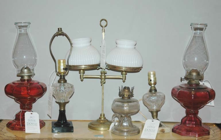 Lot image - Miscellaneous Group of Five Glass Oil Lamps; Together with a Brass Two-Light Candelabra with Glass Shades