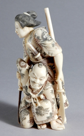 Lot image - Japanese Ivory Okimono of a Female Subduing a Male