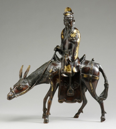 Lot image - Chinese Gilt Splashed Bronze Sculpture of a Scholar on a Donkey