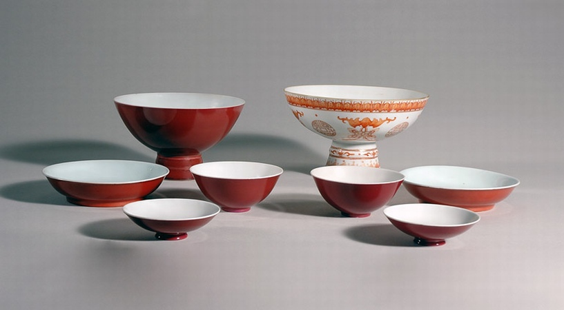 Lot image - Together with an Iron Red and White Glazed Porcelain Stem bowl with Bat and Coin Design.