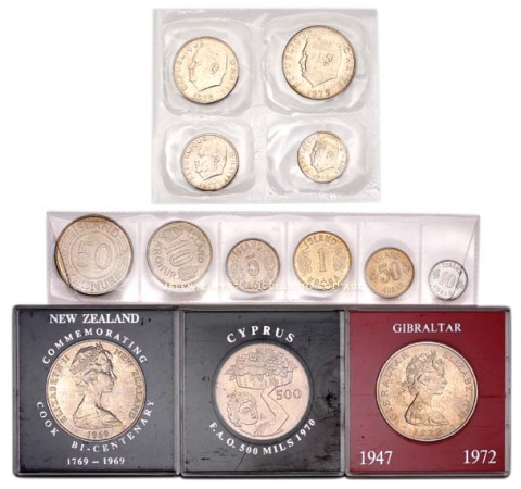 Lot image - WOLDWIDE: Group of Approximately Twenty-Five Modern Coins or Proof Sets