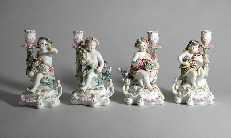 Lot image - Set of Four Chelsea Style Porcelain Figural Candlesticks
