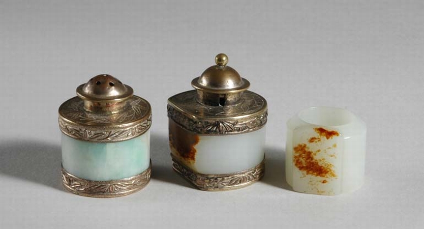 Lot image - Group of Three Chinese Jade Archers Rings; Together with a Chinese Jade Snuff Bottle
