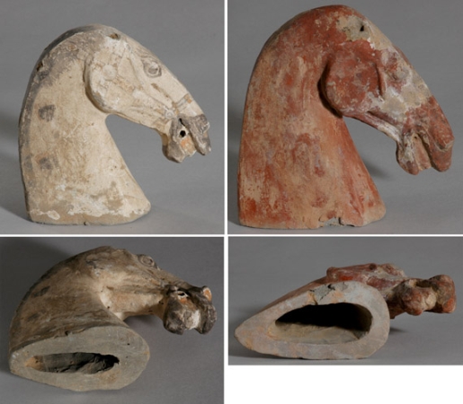 Lot image - Two Painted Pottery Horse Heads