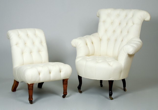 Lot image - Victorian Ebonized Tufted Armchair; Together with a William IV Provincial Oak Tufted Slipper Chair