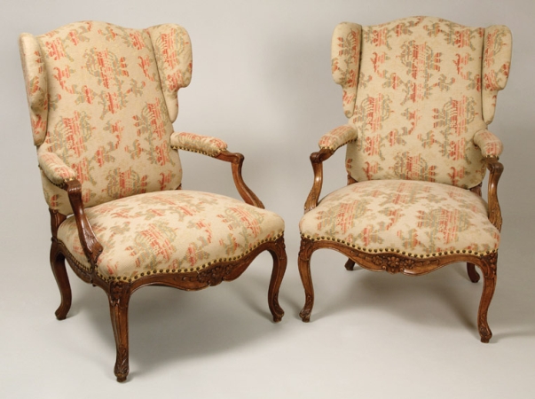Lot image - Pair of Provincial Louis XV Style Walnut Wing Armchairs