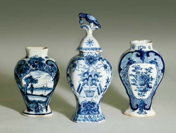 Lot image - Two Dutch Delft Urns; Together with a Continental Faience Blue and White Covered Urn