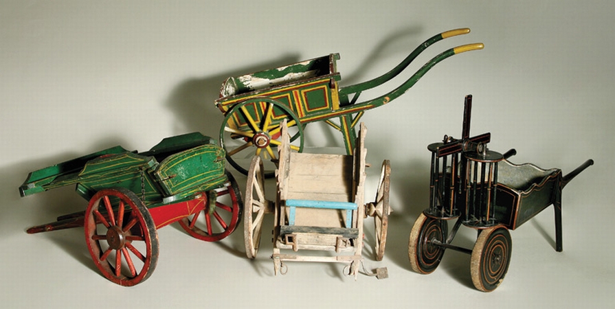 Lot image - Miscellaneous Group of Three Painted Wood Miniature Wheel Barrows; Together with a Wagon