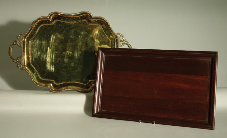 Lot image - Molded Brass Two-Handled Tray; Together with a Molded Mahogany Rectangular Tray