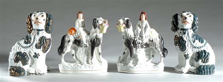 Lot image - Eight Staffordshire Pottery Figural Groups