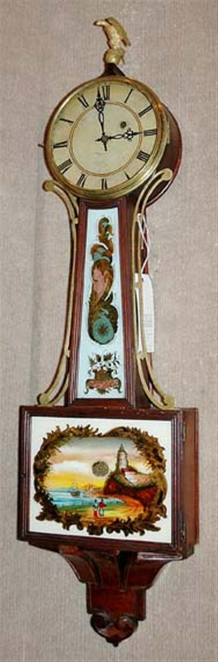 Lot image - Mahogany and Eglomise Brass Mounted Banjo Clock