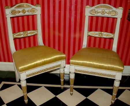Lot image - Pair of Charles X Parcel Gilt and Cream Painted Side Chairs