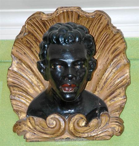Lot image - Continental Gilt Decorated and Black Painted Bust of a Blackamoor