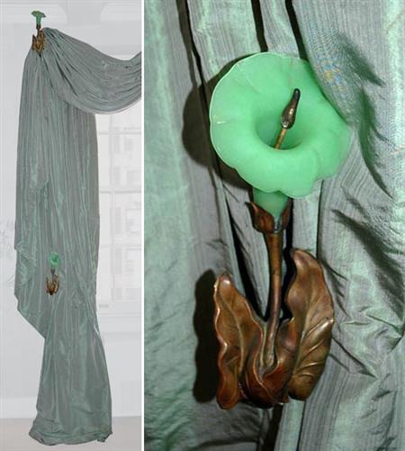 Lot image - Set of Four French Gilt-Metal and Green Glass Lily-Form Tiebacks; Together with Blue Silk Drapes