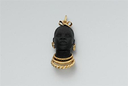 Lot image - Gold and Carved Ebony Blackamoor Pendant