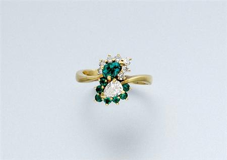 Lot image - Emerald and Diamond Crossover Ring