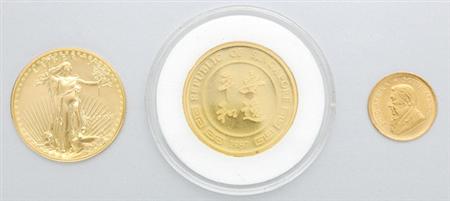 Lot image - Three U.S. Gold Coins and One Krugerrand