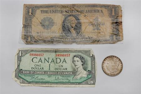Lot image - Assorted Currency and One U.S. Silver Dollar