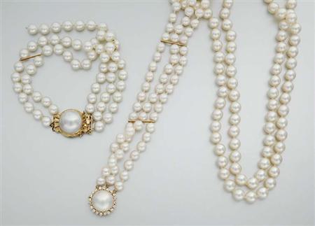 Lot image - Double Strand Cultured Pearl Necklace and Two Triple Strand Cultured Pearl Bracelets