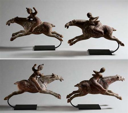 Lot image - Two Painted Pottery Polo Players