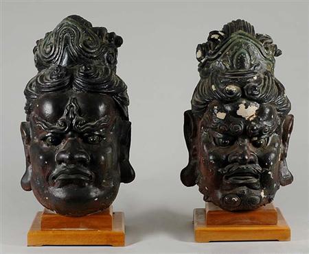 Lot image - Two Chinese Lacquered Heads of Guardians