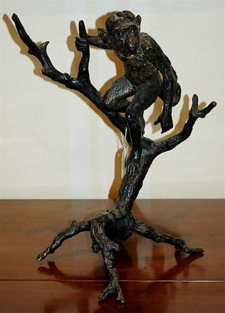 Lot image - Bronze Figure of a Monkey in a Tree Height 16 inches (41 cm).