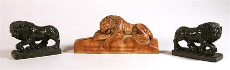 Lot image - Pair of Marble Recumbent Lions; Together with a Wooden Lion