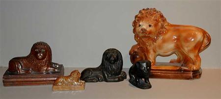 Lot image - Miscellaneous Group of Nine Lion Bookends,  Door Stops and Boxes