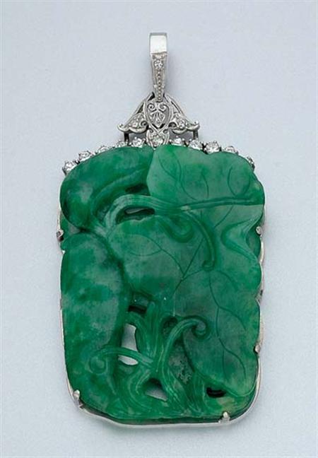 Lot image - Carved Jade and Diamond Pendant