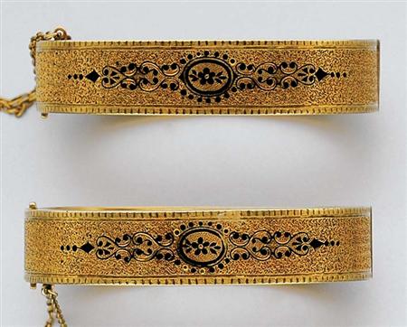 Lot image - Pair of Antique Gold and Black Enamel Bangles