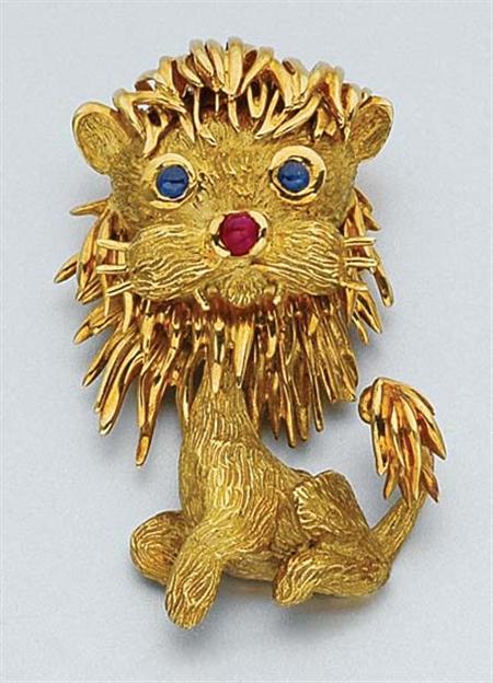 Lot image - Gold, Ruby and Sapphire Lion Brooch