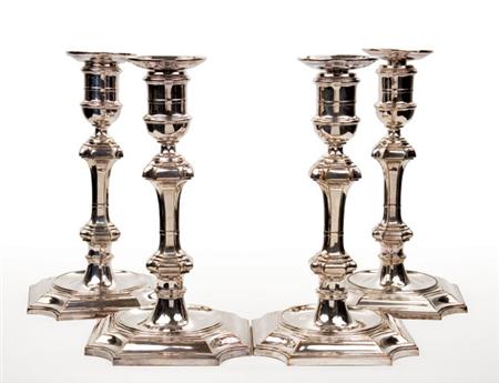 Lot image - Set of Four English Silver Plated Candlesticks