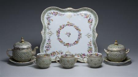 Lot image - Meissen Style Gilt and Polychrome Decorated Porcelain Tea Service