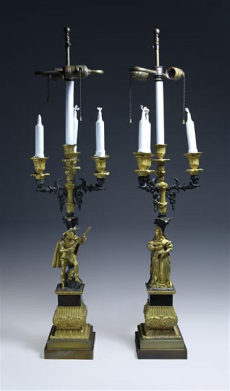 Lot image - Pair of Renaissance Style Gilt and Patinated-Bronze Figural Four-Light Candelabra