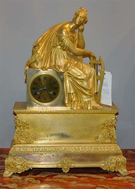 Lot image - Louis Philippe Gilt-Metal Figural Mantel Clock