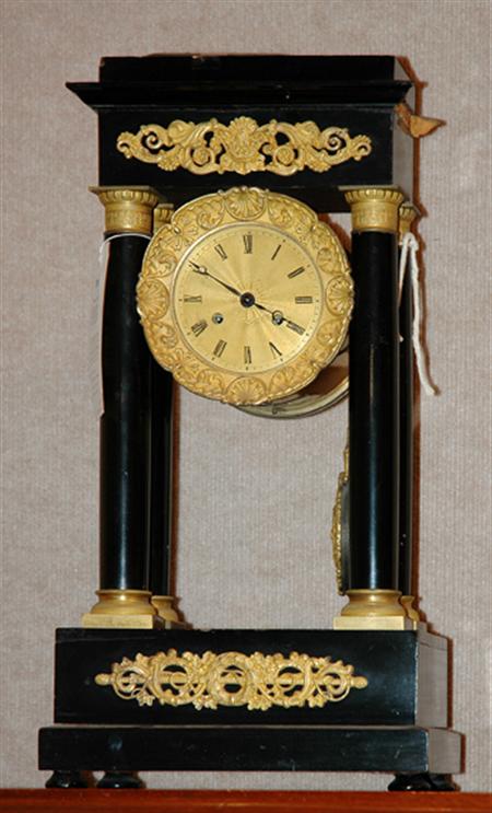 Lot image - Louis Philippe Gilt-Metal Mounted Ebonized Portico Clock