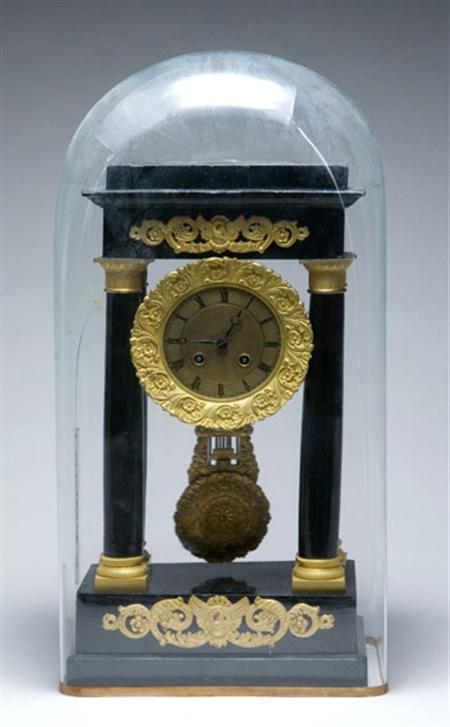 Lot image - Louis Philippe Gilt-Metal Ebonized Portico Clock