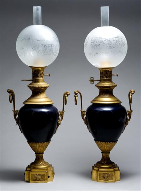 Lot image - Pair of Sevres Style Gilt-Metal Mounted Porcelain Oil Lamps