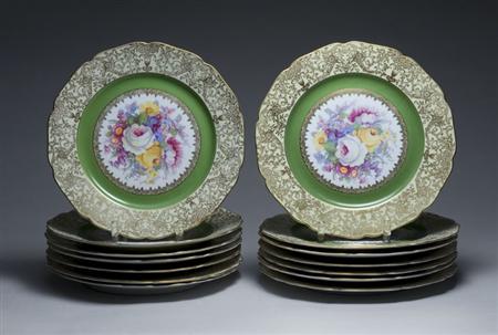 Lot image - Set of Fourteen Czechoslovakian Gilt Decorated Porcelain Service Plates