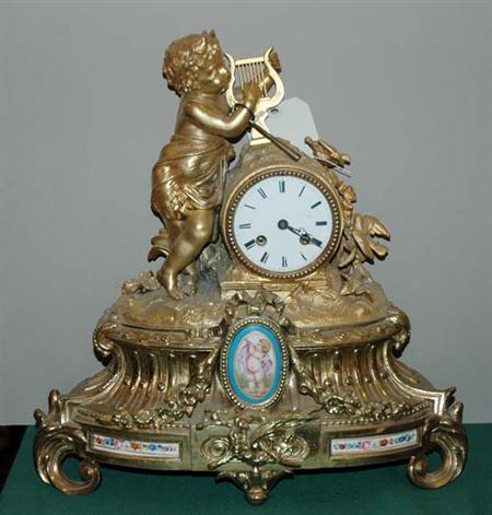 Lot image - Louis XVI Style Porcelain Mounted Gilt-Metal Figural Mantel Clock