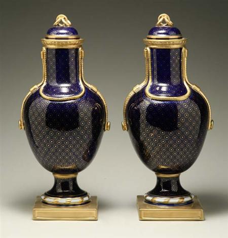 Lot image - Pair of Sevres Style Gilt Decorated Pedestal Vases