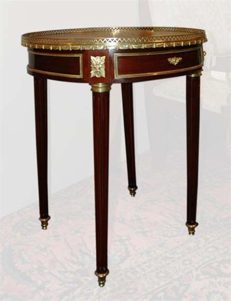 Lot image - Louis XVI Style Gilt-Metal Mounted Mahogany Bouillotte Table