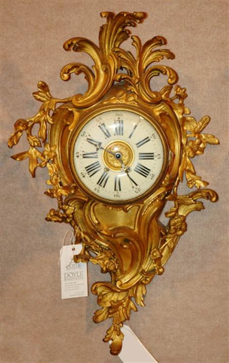 Lot image - Louis XV Style Gilt-Metal Cartel Clock