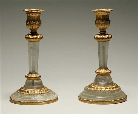 Lot image - Pair of Louis XVI Style Gilt-Metal Mounted Rock Crystal Candlesticks